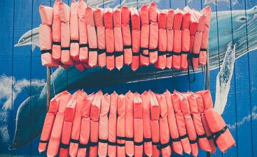 Two lines of adult life jackets for boats