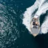 A boat leaning to one side on plane